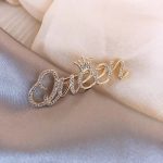 Gold silver diamond letter brooch