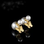 Butterfly pearl pendant earrings