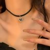 Black leather and gold pendant necklace