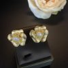 Leaf-filled diamond earrings