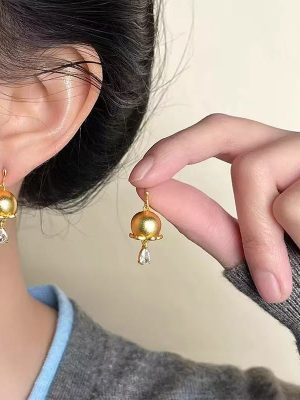 Gold diamond pendant earrings