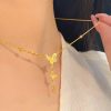 Gold Pearl and Bow Pendant Necklace